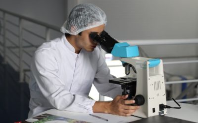 man sight on white microscope
